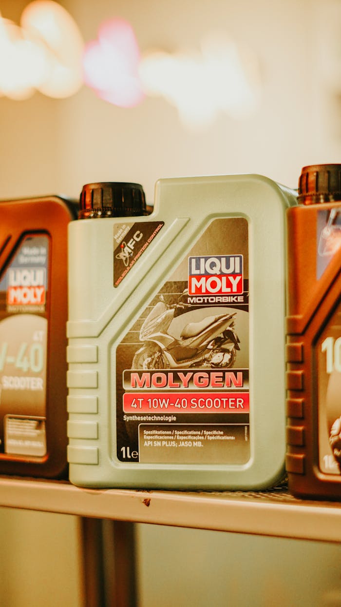 Liqui Moly motorbike oil containers on display, photographed in a store setting in Jakarta.